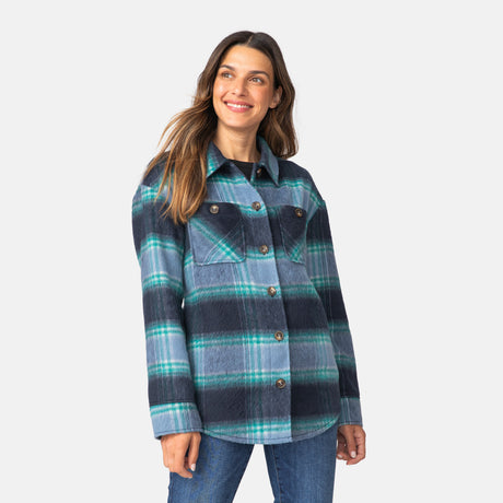 [Olga is 5'9" wearing a size Small.] Woman wearing Free Country Women's Hayley Plaid Shacket in blue and grey and green plaid with a full front button opening, chest pockets, light grey background. Best women’s jacket for fall weather.