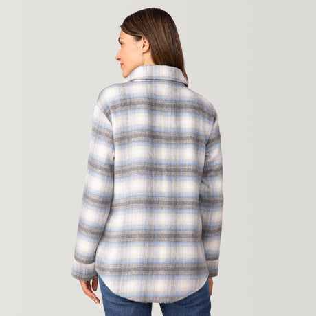 [Olga is 5'9" wearing a size Small.] Woman wearing Free Country Women's Hayley Plaid Shacket in blue and grey and white plaid with a full front button opening, chest pockets, light grey background. Best women’s jacket for fall weather.
