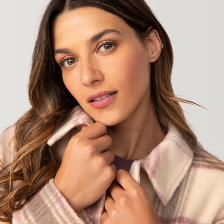 [Olga is 5’9" wearing a size Small.] Woman wearing Free Country Women's Hayley Plaid Shacket in pink and brown plaid with a full front button opening, chest pockets, light grey background. Best women’s jacket for fall weather.