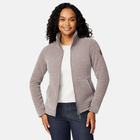 [Angelique is 5'10" wearing size S.] Women’s light brown zip-up jacket with high collar and textured finish, styled with two front pockets and paired with dark blue jeans against a plain white background.