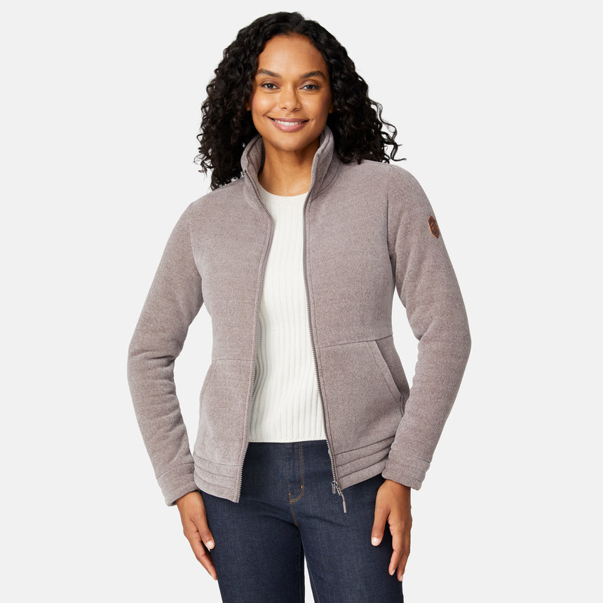 [Angelique is 5'10" wearing size S.] Women’s light brown zip-up jacket with high collar and textured finish, styled with two front pockets and paired with dark blue jeans against a plain white background.