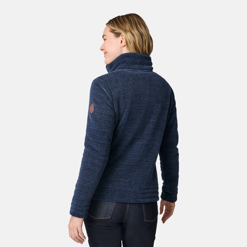 [CJ is 5'10" wearing size S.] Women’s dark blue zip-up fleece jacket with high collar, soft textured fabric, and dual front pockets—features a patch on the left sleeve and is styled with hands in pockets against a plain white background.