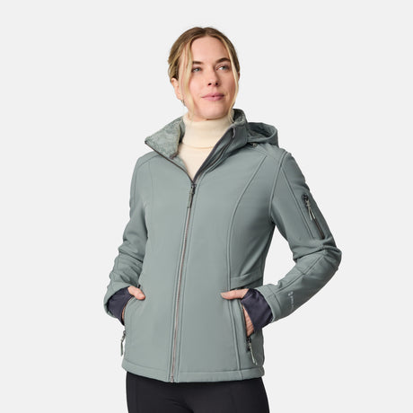 [CJ is 5'10" wearing size S.] Woman wearing a green Free Country softshell jacket with a hood on a white background