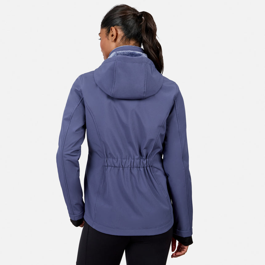 [Model is wearing size S.] A woman shown from the back wearing a slate blue hooded jacket with a drawstring waist, paired with black pants, against a light gray studio background.