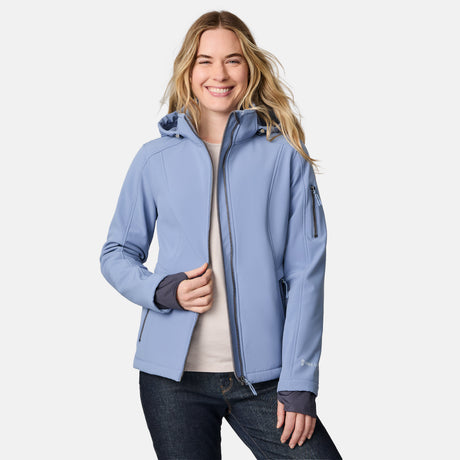 [CJ is 5'10" wearing size S.] Woman wearing a blue Free Country softshell jacket with a hood on a white background