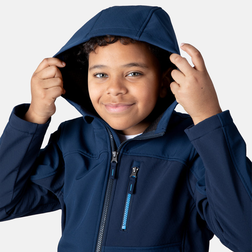 [Model is wearing size M.] Model wearing a blue Free Country softshell jacket with a contrast zippered chest pocket and side-entry hand pockets; lightweight water-resistant construction with an active fit, ideal for transitional weather and casual outdoor wear.