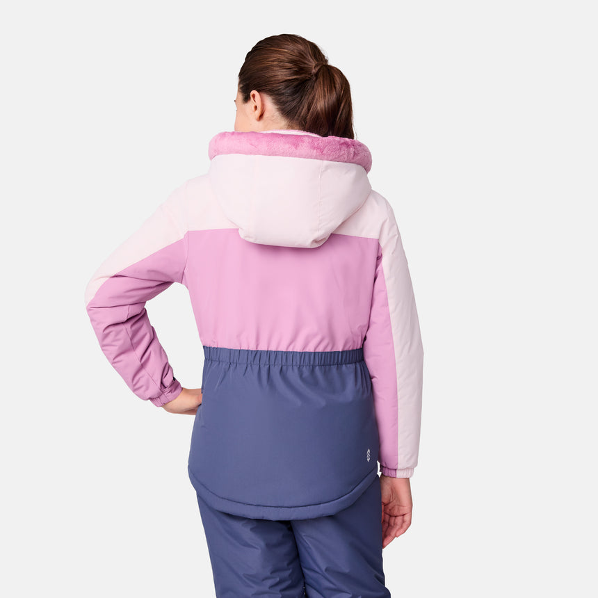 [Samantha is wearing size M.] Model wearing a Free Country color-blocked winter jacket in pink and navy, featuring a fuzzy-lined hood, zippered chest and hand pockets, and insulated design for cold-weather comfort. Paired with matching navy snow pants for outdoor adventures.