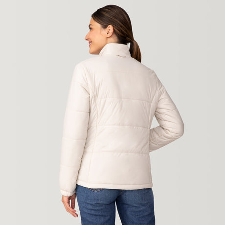 [Olga is 5’9” wearing a size Small.] Woman wearing Free Country Women's Back of Bell 3-in-1 Systems Jacket in white with a full front zipper opening, soft lining, attached hood with adjustable drawcords, and water resistant and wind resistant stretch performance fabric, inner puffer jacket, outer shell for weather, light grey background. Perfect women’s  jacket for fall weather.