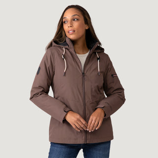 [Shelby is 5’9” wearing a size Small.] Woman wearing Free Country Women's Back of Bell 3-in-1 Systems Jacket in brown with a full front zipper opening, soft lining, attached hood with adjustable drawcords, and water resistant and wind resistant stretch performance fabric, inner puffer jacket, outer shell for weather, light grey background. Perfect women’s  jacket for fall weather.