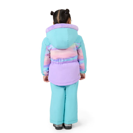 A child viewed from the back wearing a pastel winter outfit with a hooded jacket featuring turquoise, pink, and lavender sections, paired with matching turquoise pants, on a plain white background.