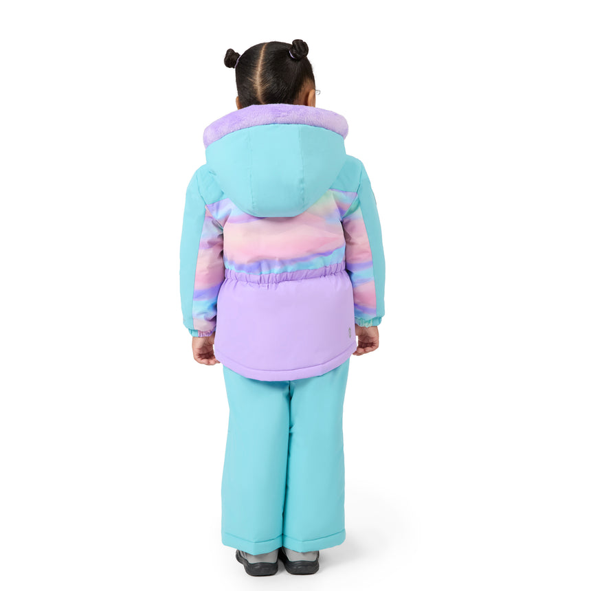 A child viewed from the back wearing a pastel winter outfit with a hooded jacket featuring turquoise, pink, and lavender sections, paired with matching turquoise pants, on a plain white background.