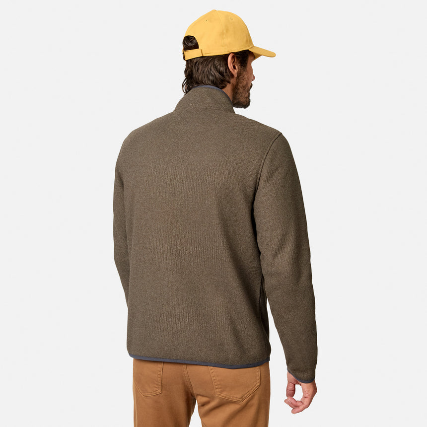 [Model is wearing size M.] A man shown from the back wearing a brown heathered quarter-zip fleece jacket, tan pants, and a yellow baseball cap, photographed against a light gray studio background.