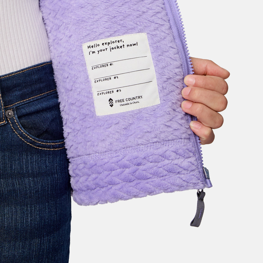 [Samantha is wearing size M.] Girls' light purple textured fleece jacket with high collar and zip front — soft, cozy layer with side pockets for cold-weather comfort