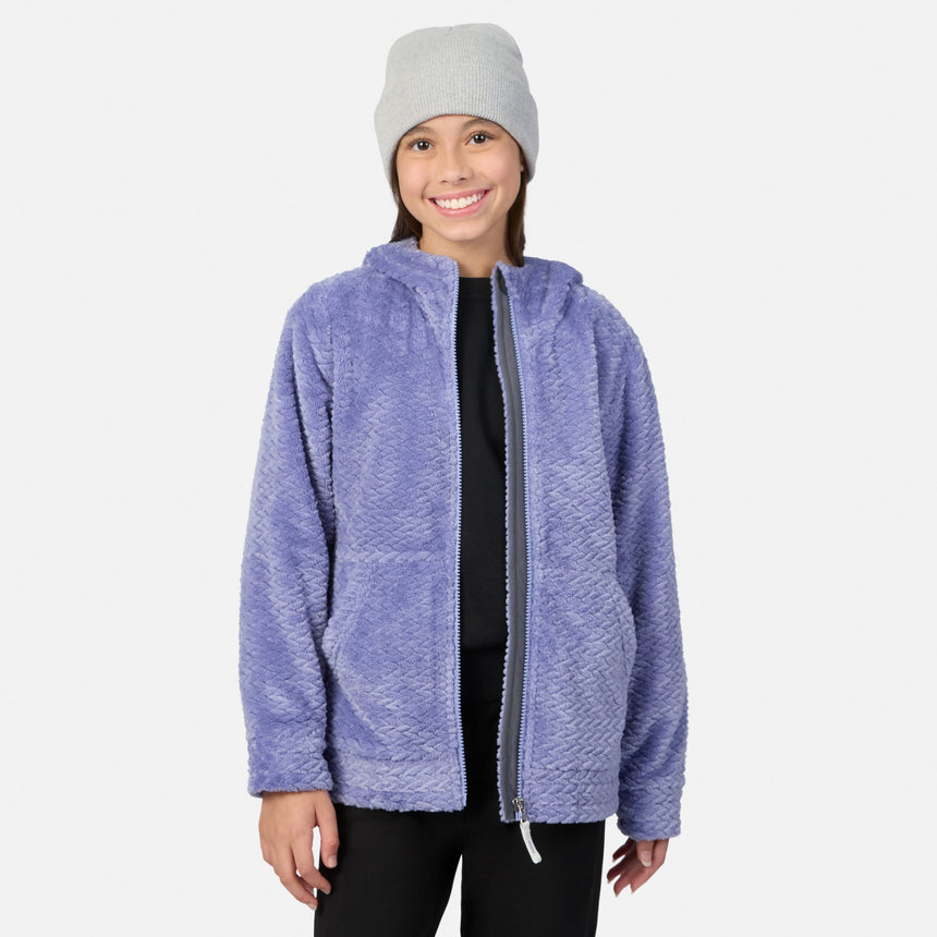A smiling girl wearing a lavender Girls’ Braided Butter Pile® Jacket and a gray beanie.