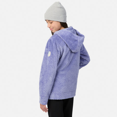 A girl wears a grey knit beanie and a purple Girls’ Braided Butter Pile® Jacket, a hooded zip-up fleece with a textured, braided pattern.