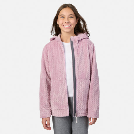 A girl wearing a pink Girls’ Braided Butter Pile® Jacket with a hooded design and a gray zipper over a white shirt.
