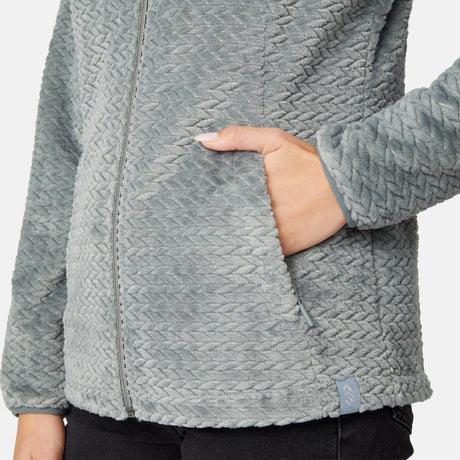 [Jessica is 5'9.5" wearing size S.] Woman wearing a green quilted fleece jacket on a light gray background