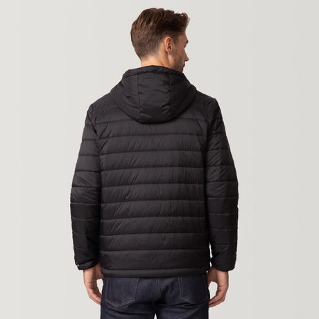 [Matt is 6'2" wearing a size Medium.] Man wearing the Free Country Men's Tri-Color Hooded Puffer Jacket in black with horizontal stripes in blue, brown, and grey, standing against a plain light background.