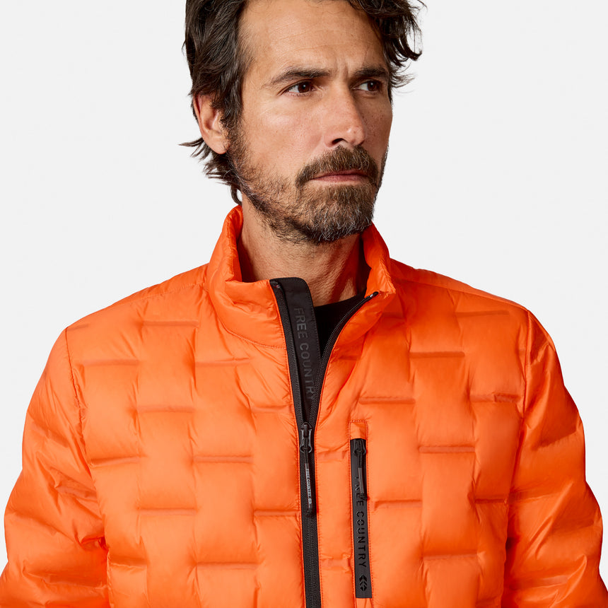 [Model is wearing size M.] A close-up of a man wearing a bright orange quilted puffer jacket with a black front zipper and black vertical zipper pulls featuring the brand name 'Free Country'.