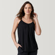 [Model is 5’9” wearing a size Small.] Free Country Women's Free2B B Cool V-Neck Built-In Bra Cami Top - Black - S#color_black