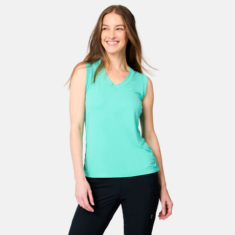 [Kaitlyn is 5'9" wearing size S] Woman wearing a turquoise sleeveless top and black pants on a white background