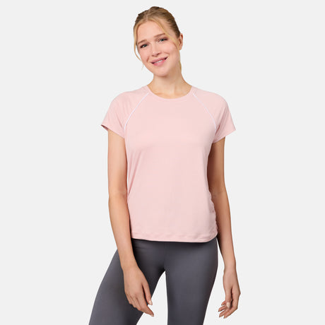 [Emily is 5'10" wearing size S] Woman wearing a pink t-shirt and gray leggings on a white background