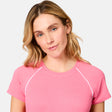 [Brooke is 5'9" wearing size S] Woman wearing a pink shirt with white accents on a plain background