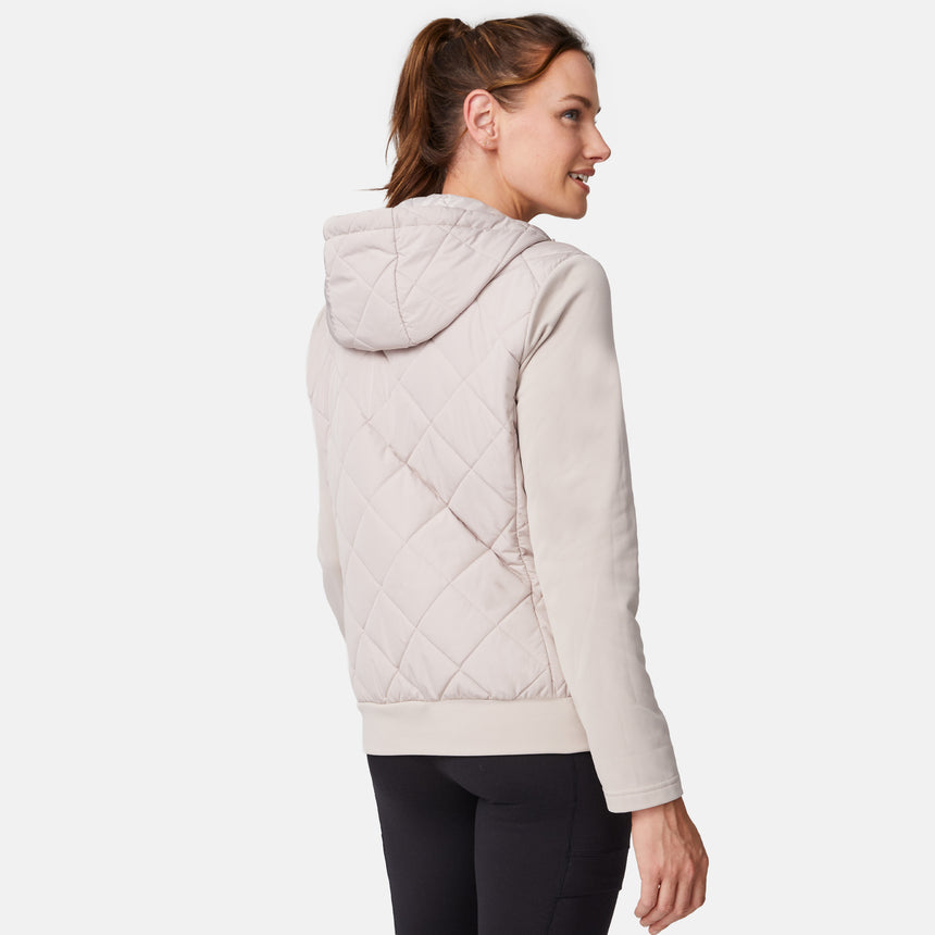 [Emily is 5'9" wearing size S.] Women’s light-colored quilted jacket with diamond-pattern stitching, zip-front closure, hood, and zippered pockets—layered over a white long-sleeve shirt and styled with black pants for a casual, cool-weather look.