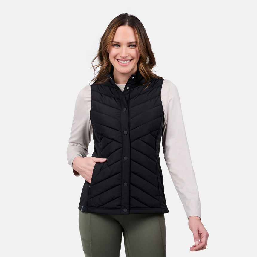 [Emily is 5'9" wearing size S] Woman wearing a black quilted vest on a white background