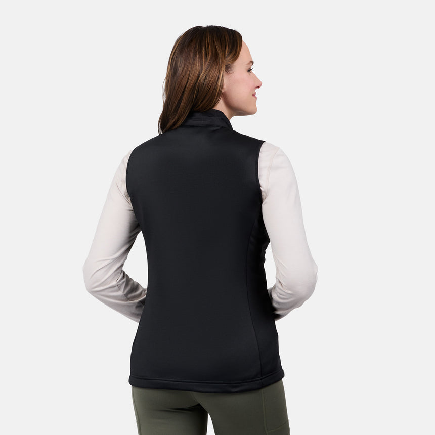 [Emily is 5'9" wearing size S] Woman wearing a black vest over a white shirt on a light gray background