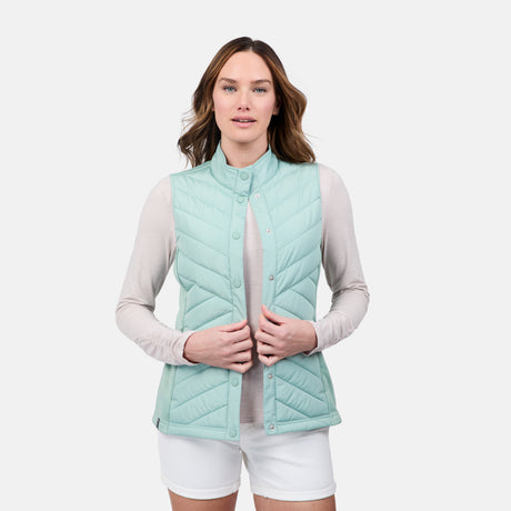 [Emily is 5'9" wearing size S] Woman wearing a light green quilted vest on a white background