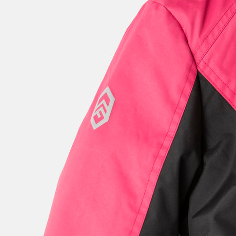 [Model is wearing a size Medium.] Girl wearing the Free Country Girls' Boarder Jacket in bright pink and black, featuring Butter Pile® lining, a wind- and water-resistant shell, and a hooded design.