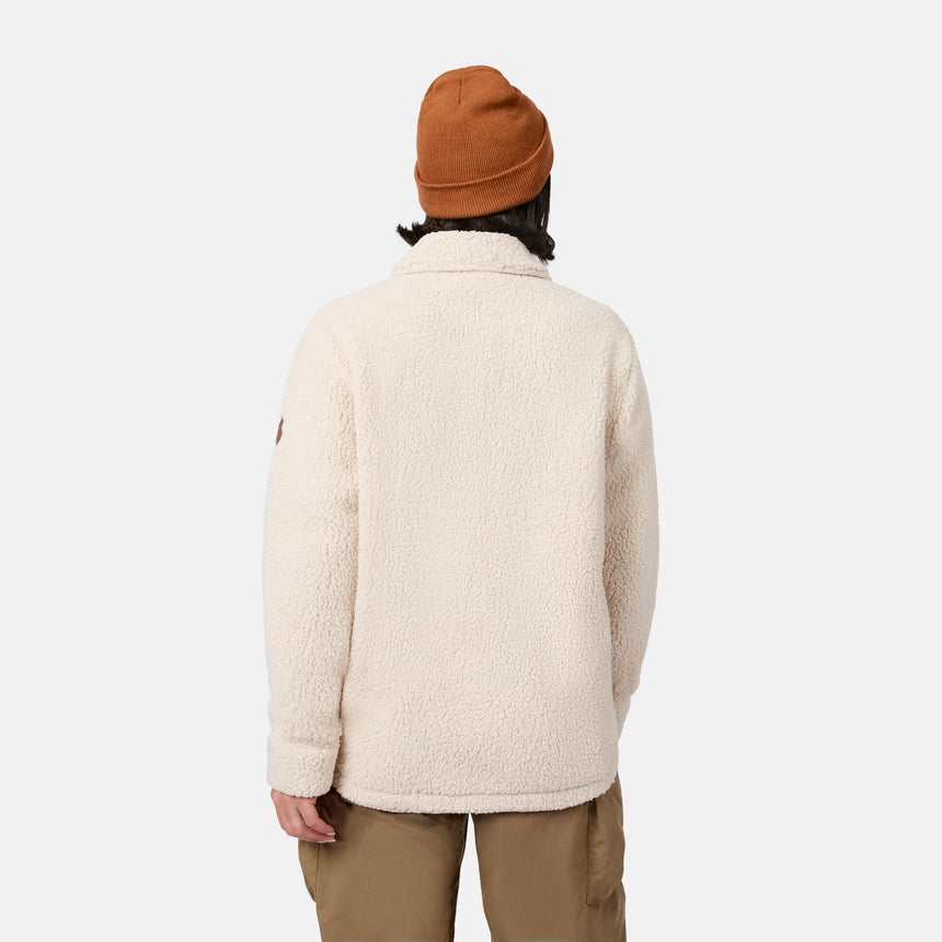 [Model is wearing size S.] A person shown from the back wearing a cream sherpa fleece jacket, a rust-orange beanie, and tan pants against a light gray studio background.