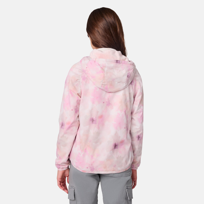 [Samantha is wearing size M.] Girls' pink and white tie-dye zip-up hoodie with hood and front zipper, styled with light grey cargo pants for a casual streetwear look