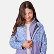 [Samantha is wearing size M.] Women's Free Country softshell jacket with floral upper print and solid lavender lower panels, featuring a zip-front closure and soft purple inner lining—designed for lightweight warmth and outdoor versatility.