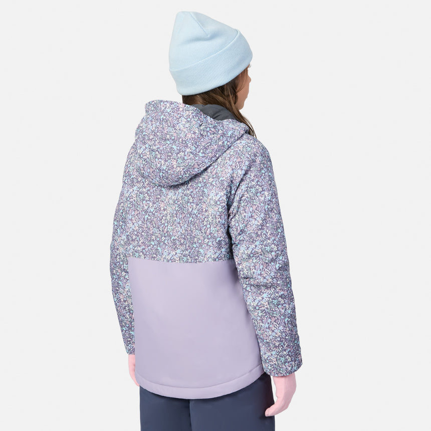 Side profile of a girl wearing the Girls' 3-in-1 Systems Jacket with a light blue beanie and lavender patterned hooded coat