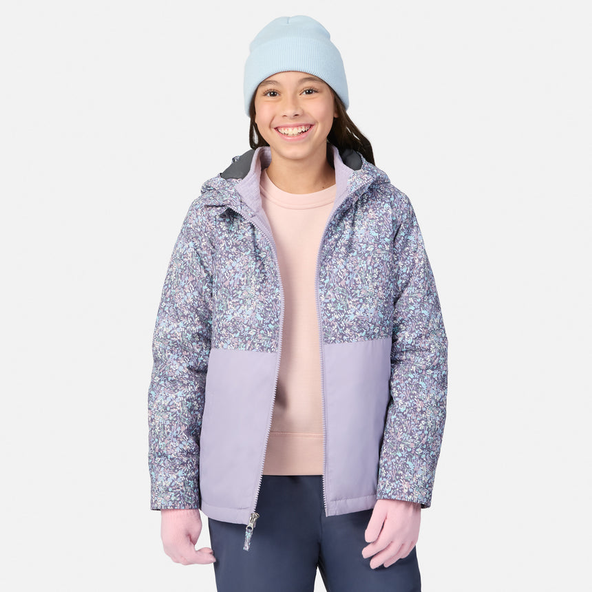 Smiling girl wearing Girls' 3-in-1 Systems Jacket in lavender floral print with a light blue beanie