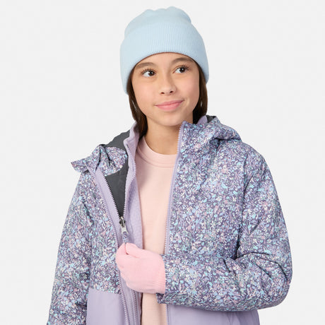 Girl wearing a light blue knit beanie and lavender 3-in-1 jacket with a pink inner layer