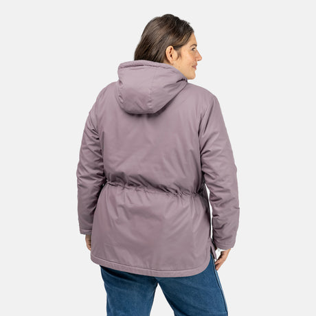[Model is wearing a size 1X.] Woman wearing Free Country Women's Cascade Windshear Jacket in light purple with a full front zipper opening, soft lining, and water resistant and wind resistant recycled polyester stretch performance fabric, light grey background. Best women’s jacket for windy weather.