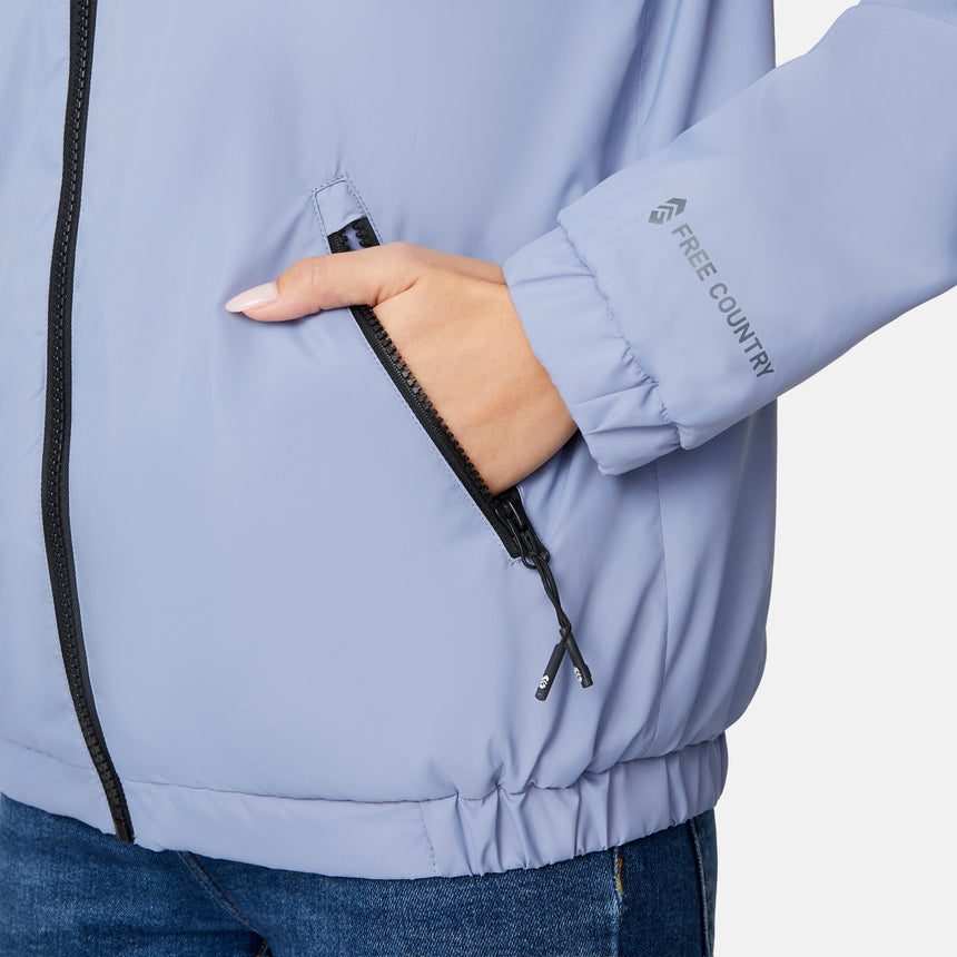 [Jessica is 5'9.5" wearing size S.] Women’s Free Country light blue hooded jacket with full-zip closure, zippered side pockets, and drawstring hood—sherpa lined for added warmth and comfort. Paired with blue jeans for a cozy, cold-weather look.