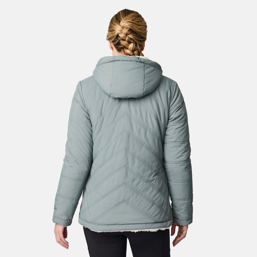 [CJ is 5'10" wearing size S.] Women’s Free Country light green quilted hooded jacket with full-zip closure, drawstring hood, and dual hand pockets—reversible to cozy sherpa for added warmth and comfort. Paired with jeans and a casual top for a laid-back, cold-weather look.