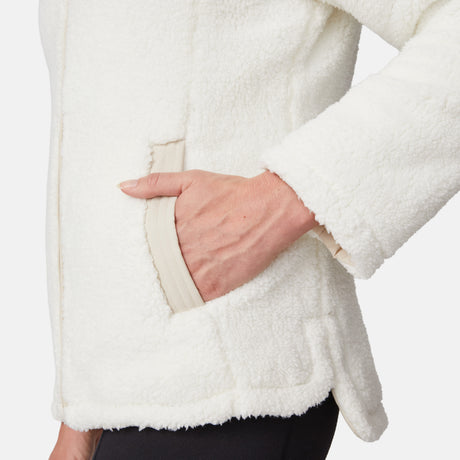 [Emily is 5'9" wearing size S.] Women’s Free Country cream-colored quilted hooded jacket with full-zip closure, drawstring hood, and dual hand pockets—reversible to cozy sherpa for versatile styling and added cold-weather comfort. Styled with jeans for a relaxed, outdoorsy look.