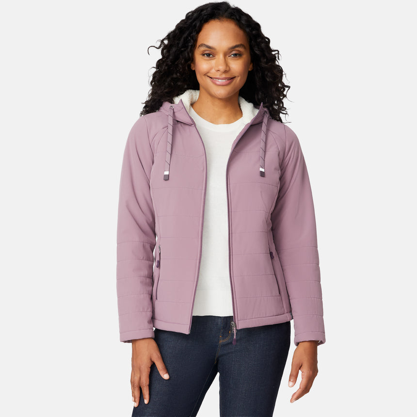[Angelique is 5'10" wearing size S.] Women’s Free Country light purple hooded jacket with full-zip closure, drawstring hood, and dual hand pockets—sherpa lined for added warmth and comfort. Paired with dark jeans for a cozy, casual cold-weather look.