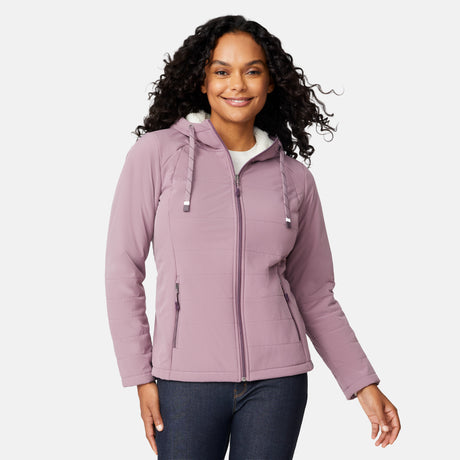 [Angelique is 5'10" wearing size S.] Women’s Free Country light purple hooded jacket with full-zip closure, drawstring hood, and dual hand pockets—sherpa lined for added warmth and comfort. Paired with dark jeans for a cozy, casual cold-weather look.