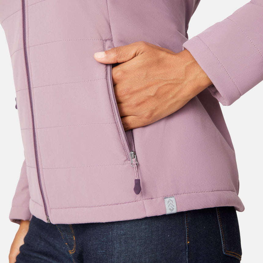 [Angelique is 5'10" wearing size S.] Women’s Free Country light purple hooded jacket with full-zip closure, drawstring hood, and dual hand pockets—sherpa lined for added warmth and comfort. Paired with dark jeans for a cozy, casual cold-weather look.