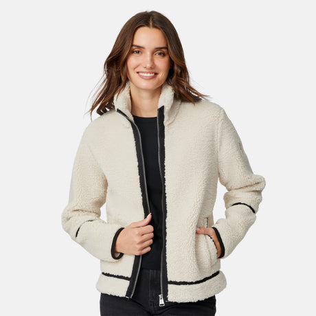 [Jessica is 5'9.5" wearing size S.] Woman wearing a cream-colored jacket with black accents on a white background