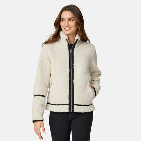 [Jessica is 5'9.5" wearing size S.] Woman wearing a cream-colored jacket with black accents on a white background