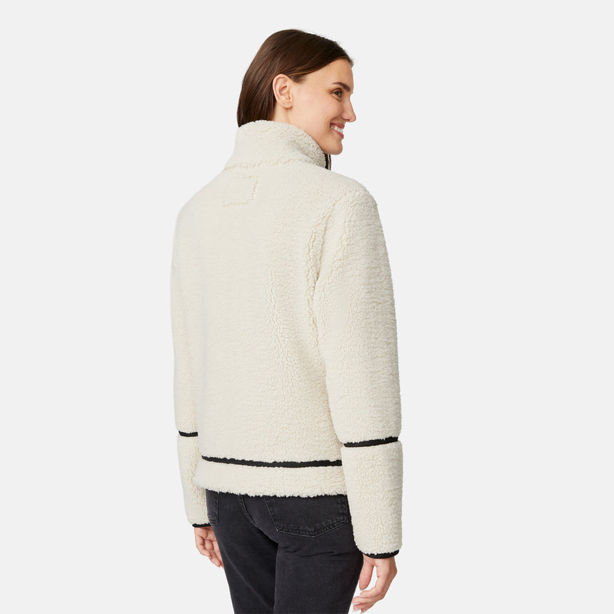 [Jessica is 5'9.5" wearing size S.] Woman wearing a cream-colored jacket with black accents on a white background