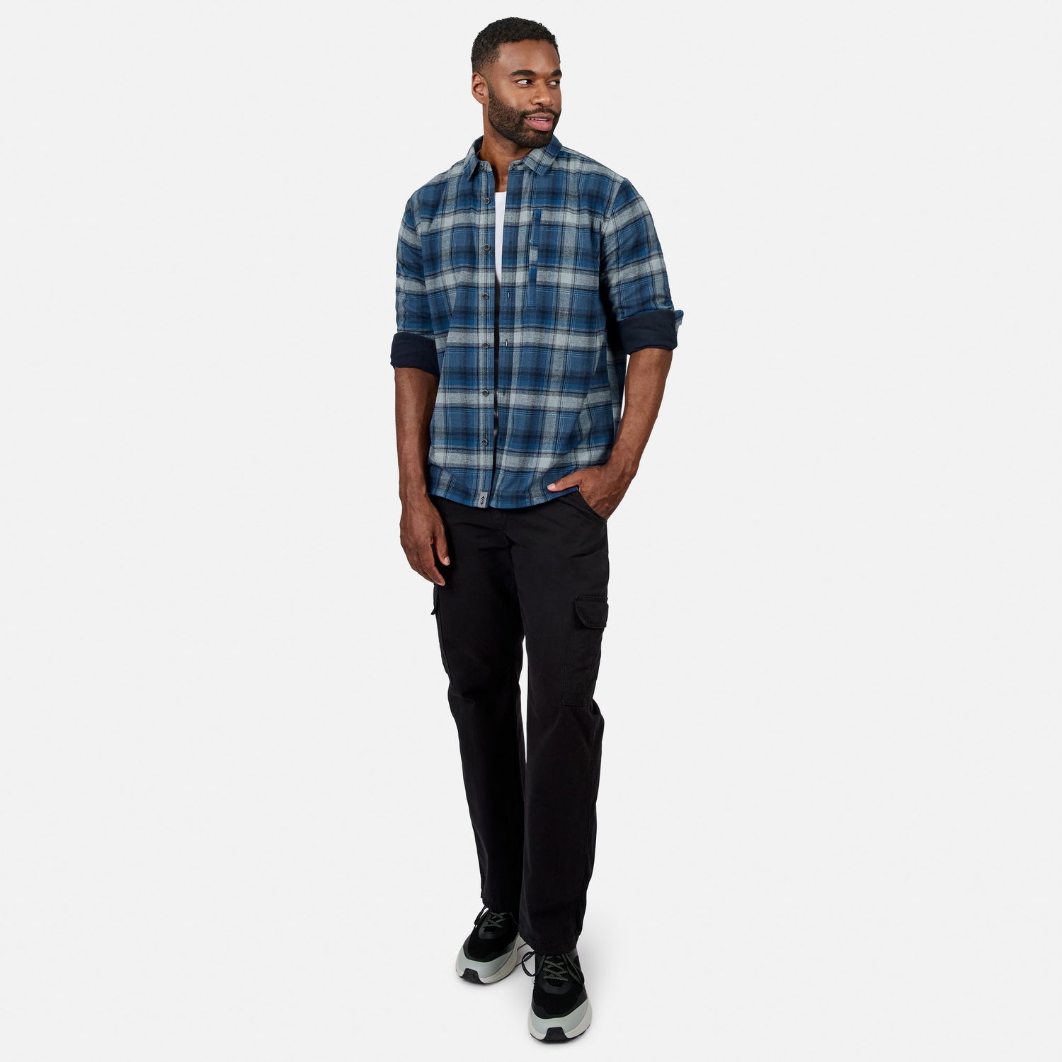 [Model is wearing size M.] Male model wearing blue gray plaid fleece lined flannel shirt with sleeves rolled up