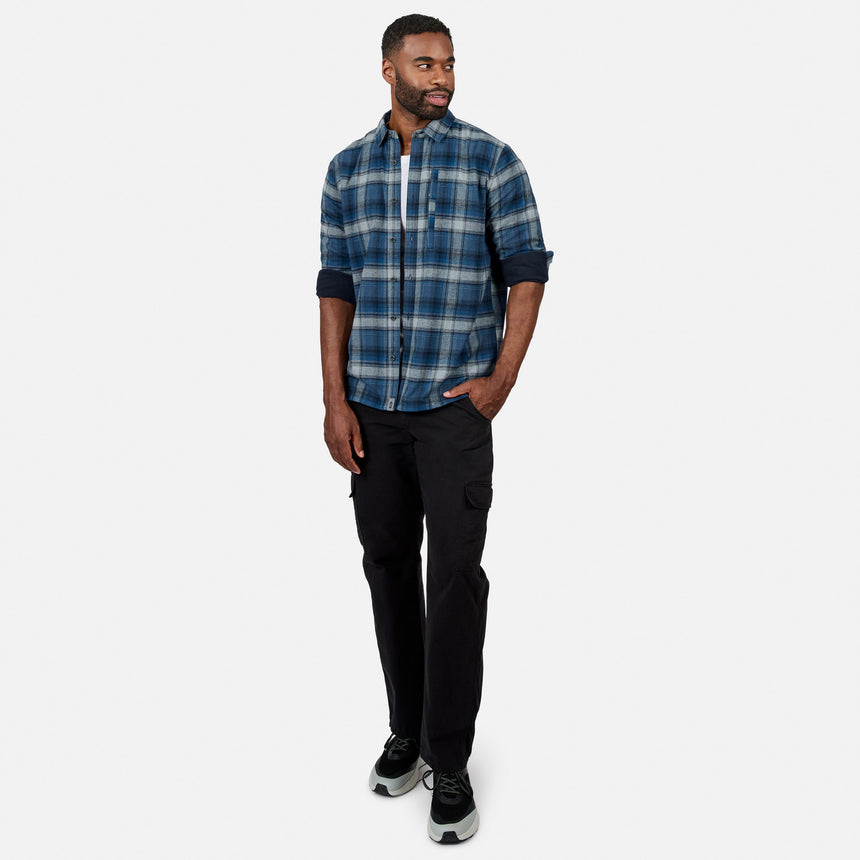 [Model is wearing size M.] Male model wearing blue gray plaid fleece lined flannel shirt with sleeves rolled up